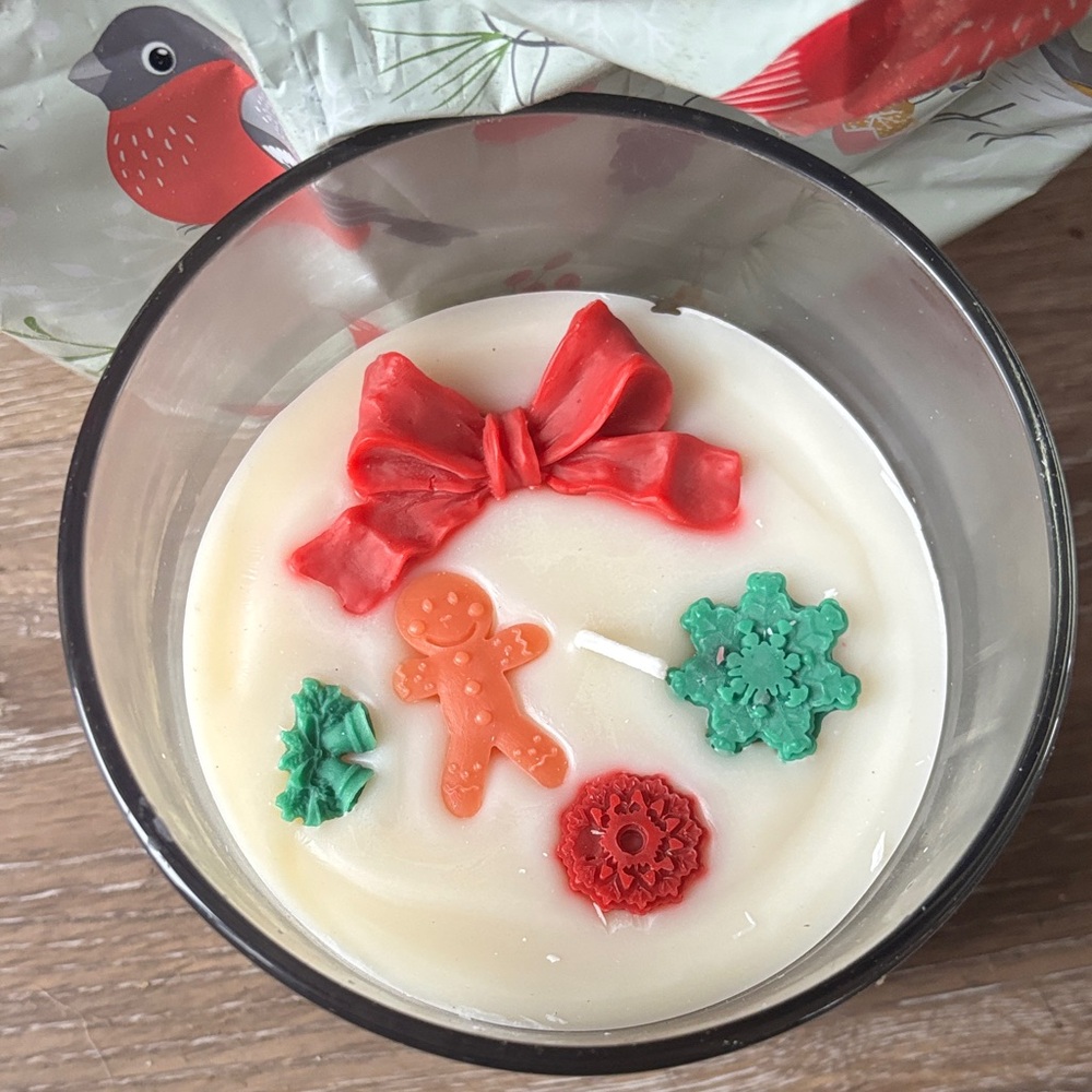 Festive Holiday Candle with Decorative Accents